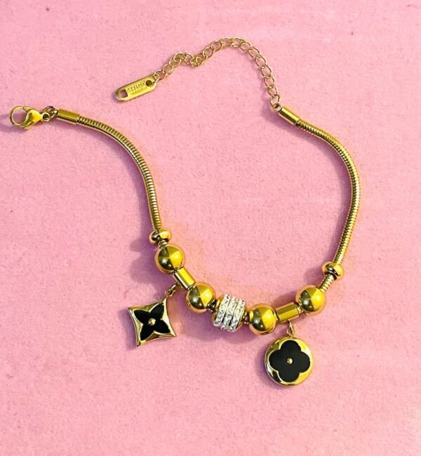 24k gold chain black clovie bracelet