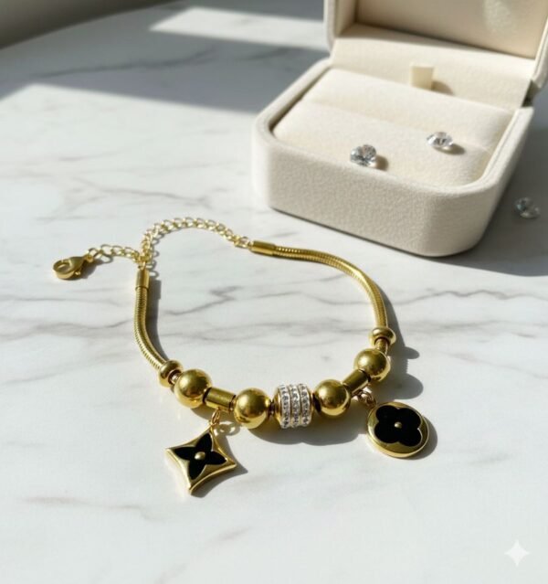 24k gold chain black clovie bracelet